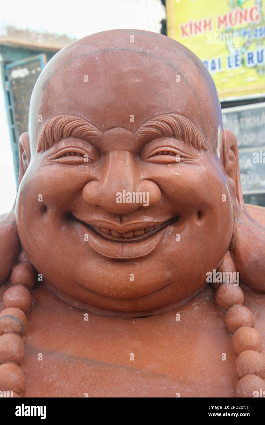 Statue di Buddha intagliate a mano fotografate a Hoi An, in Vietnam precedentemente noto come Fai-Fo o Faifoo, Foto Stock