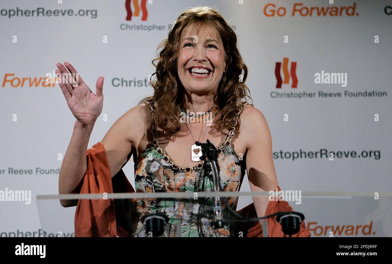 Dana Reeve, widow of actor Christopher Reeve laughs and waves as she ...