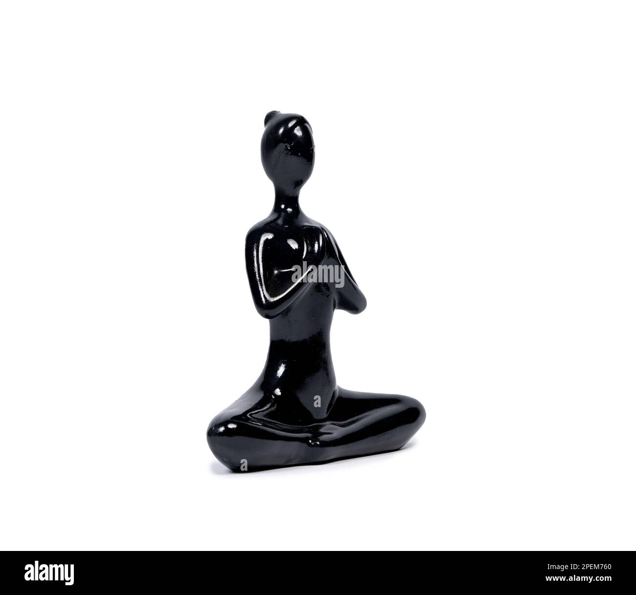Donne che fanno Yoga Sculpture isolate. Scultura nera che fa yoga. Foto Stock