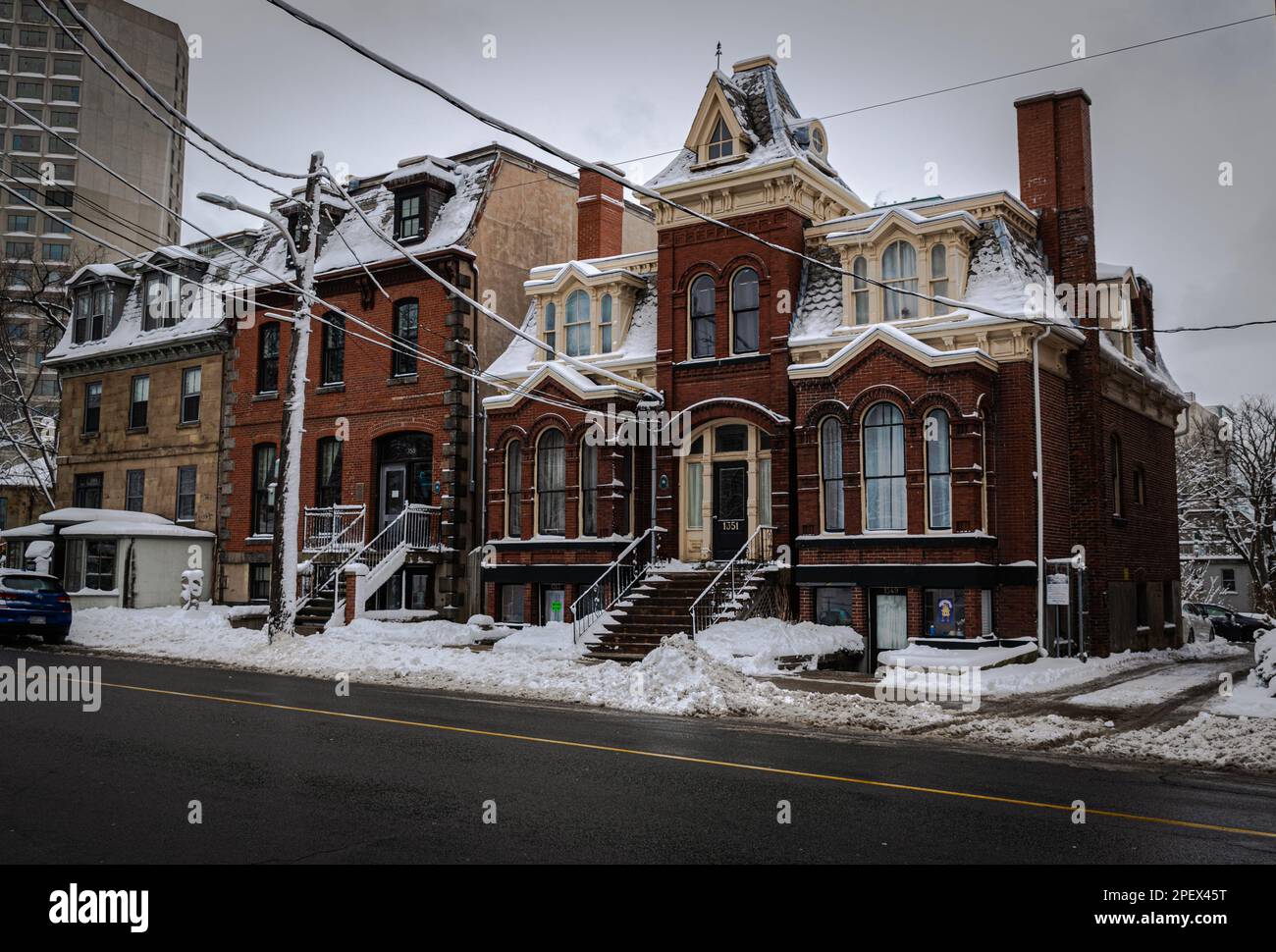 Transizione di stili architettonici della Casa Stoddard (1828), St Matthew's Manse (1874), e Renner-Carney House (1891) edifici su Barrington St Foto Stock