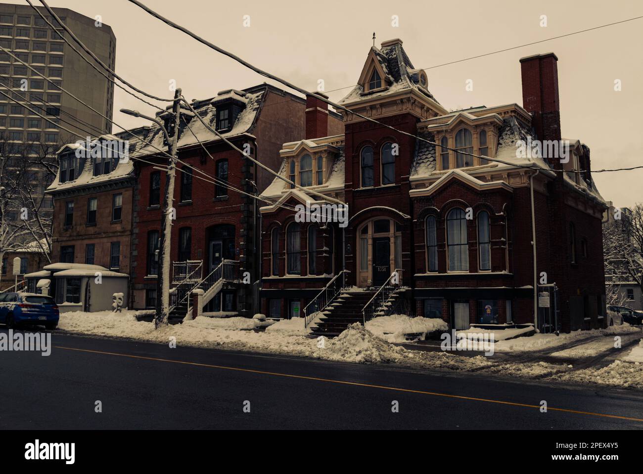 Transizione di stili architettonici della Casa Stoddard (1828), St Matthew's Manse (1874), e Renner-Carney House (1891) edifici su Barrington St Foto Stock