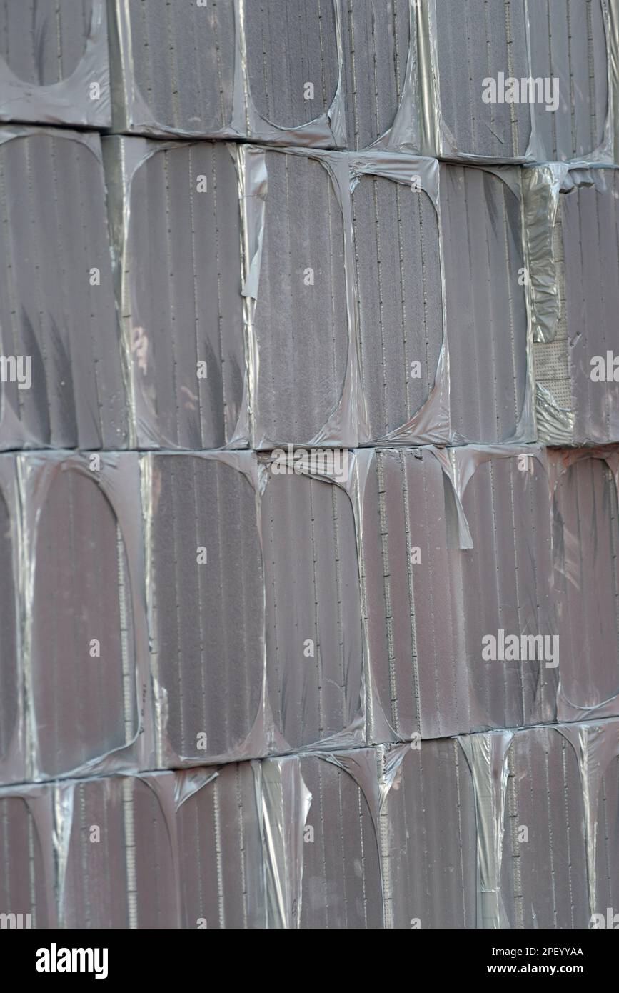 Confezioni in polistirene per pannelli isolanti in cantiere Foto Stock