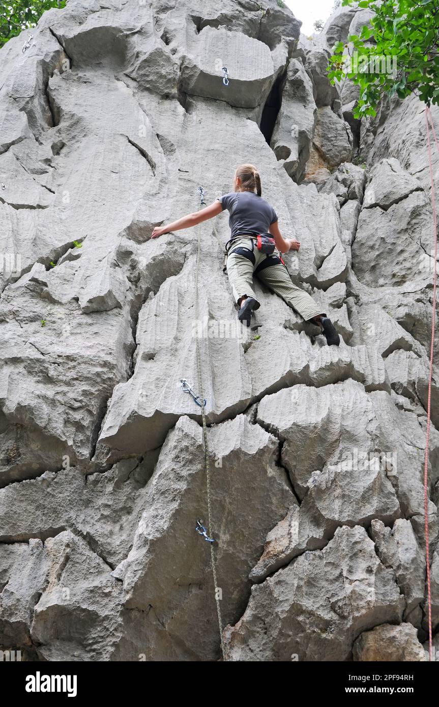 Arrampicata su roccia - donna Foto Stock