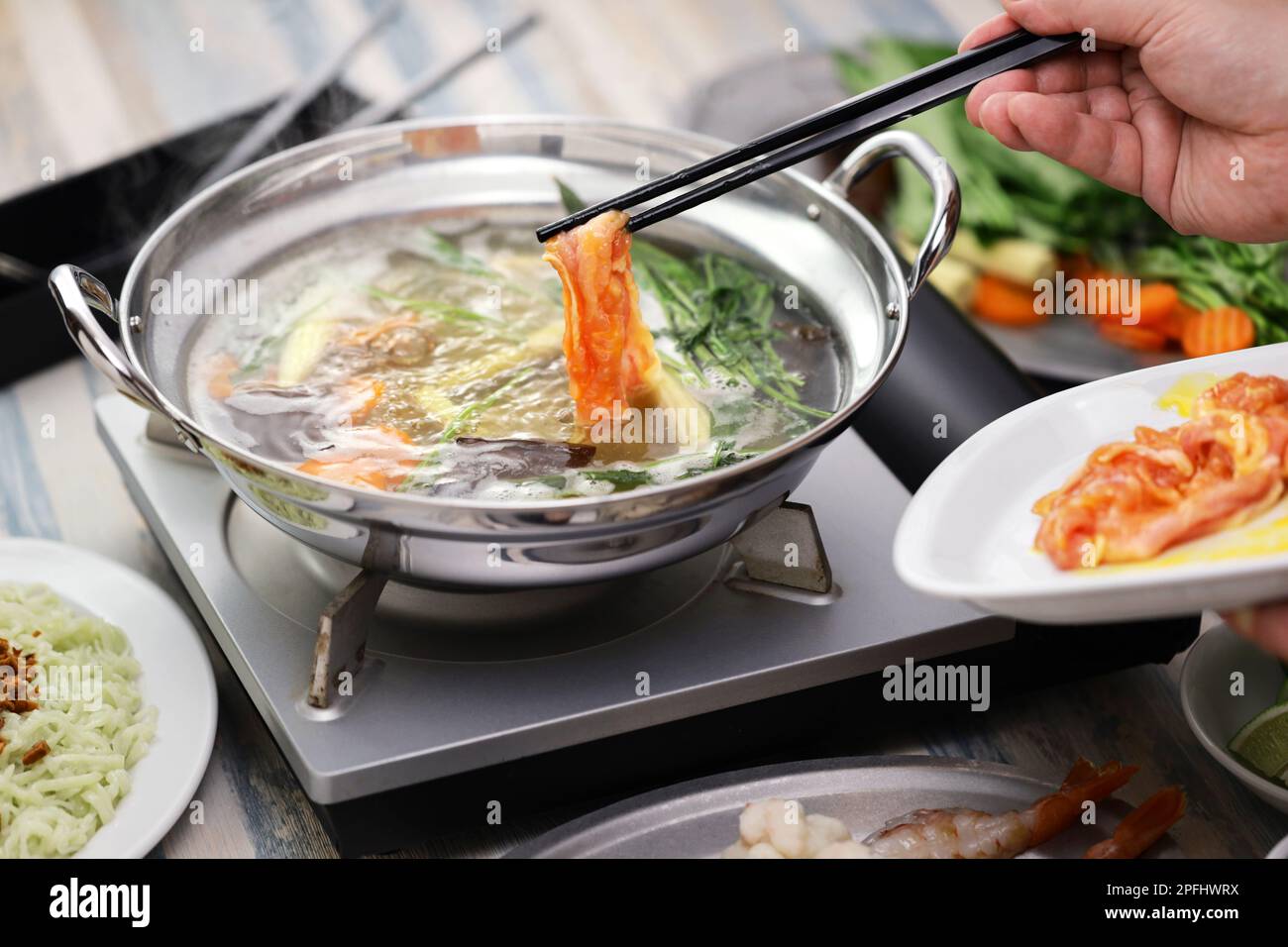 Hot pot Thai suki a casa Foto Stock