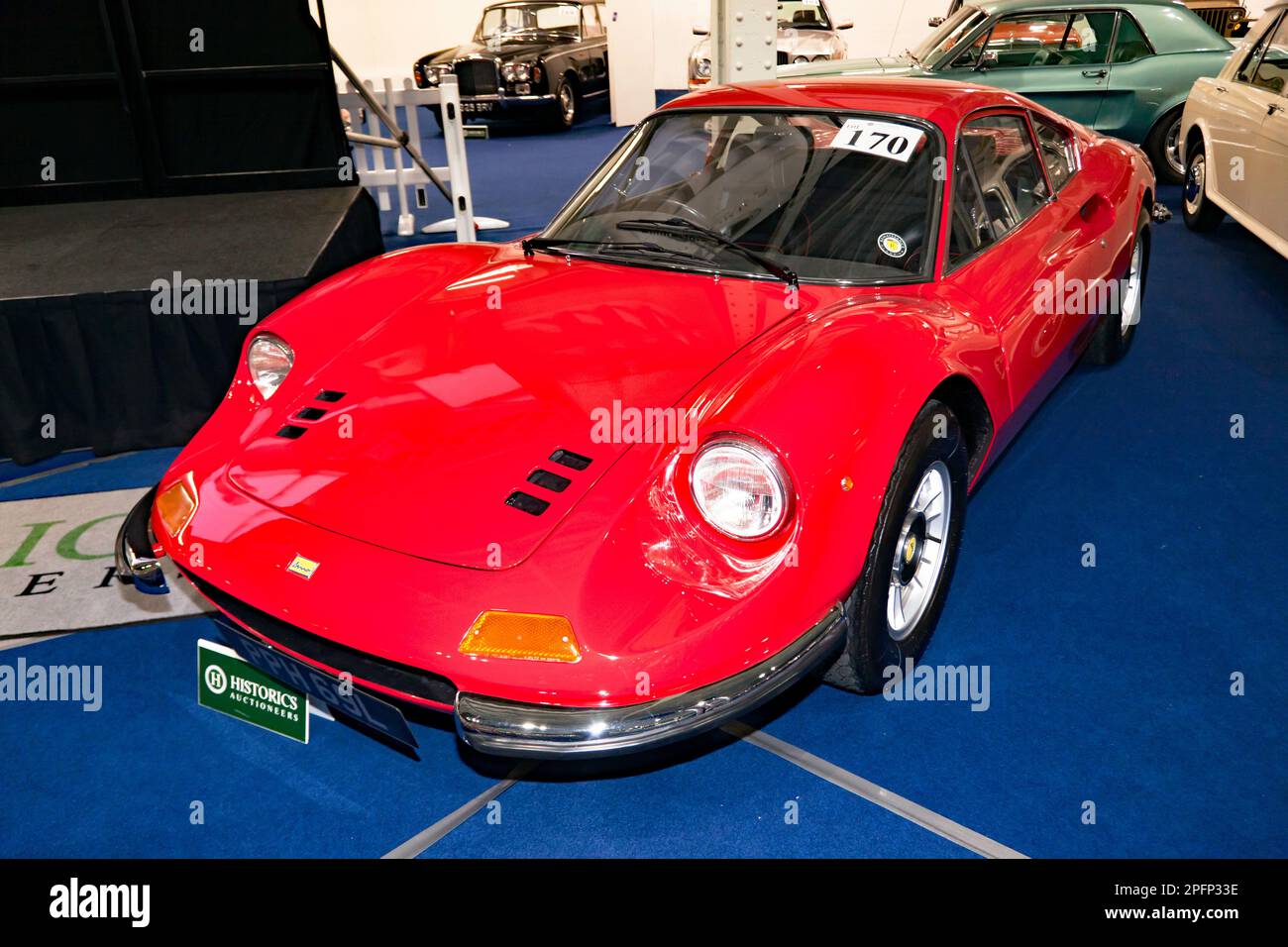 Vista frontale di tre quarti di una Red, 1973, Ferrari Dino 246 GT, parte della London Classic Car Auction 2023 ad Olympia, Londra Foto Stock