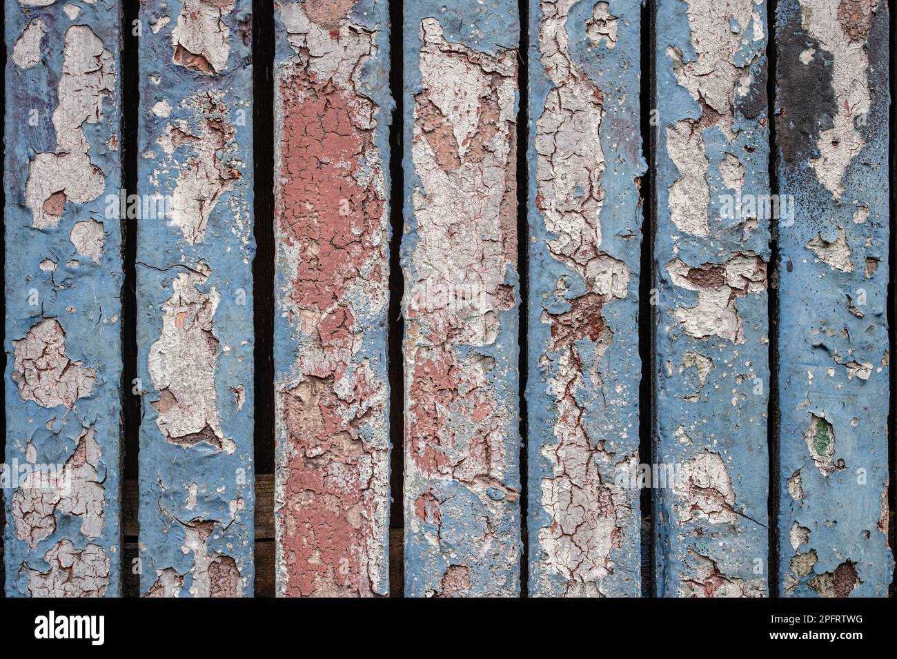 Grungy Abstract sfondo di strati di vernice di pelatura su Una porta o parete Foto Stock