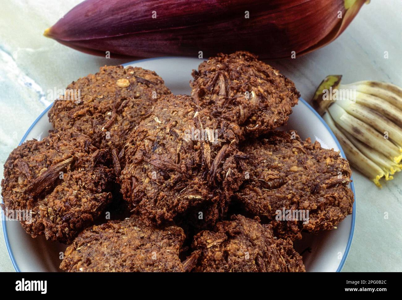 Vazhaipoo banana fiore Vadai vada (Musa acuminata) tradizionale Chettinad cibo, Tamil Nadu, India del Sud, India, Asia Foto Stock