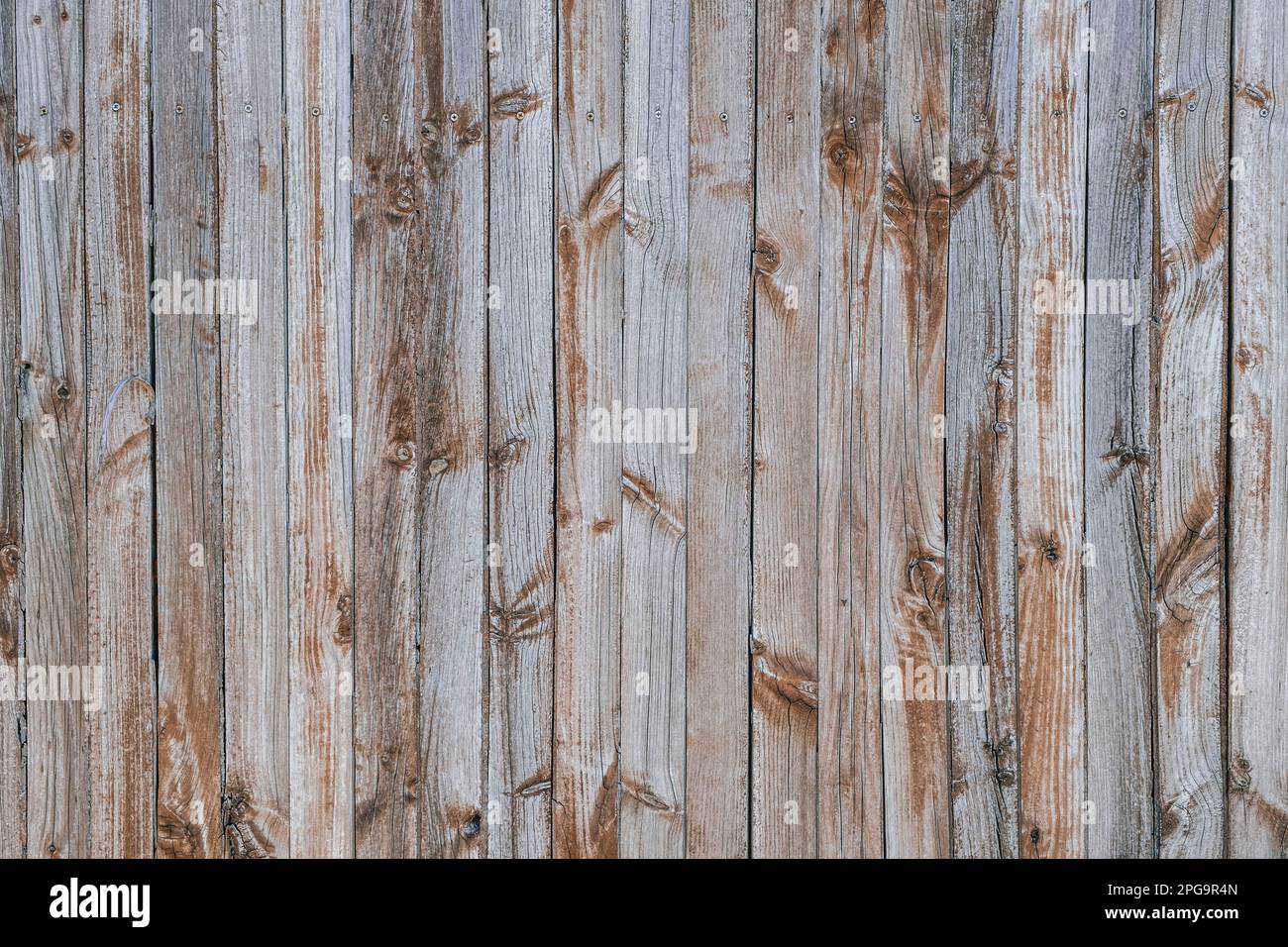 Vecchio muro di legno stagionato, sfondo rustico Foto Stock
