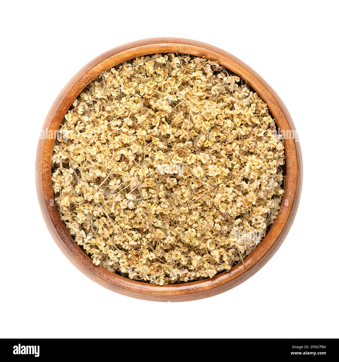 Fiori secchi di sambuco, in una ciotola di legno. Fiori di Sambucus, anche conosciuto come sambuco nero o sambuco. Utilizzato come tè nella medicina tradizionale. Foto Stock