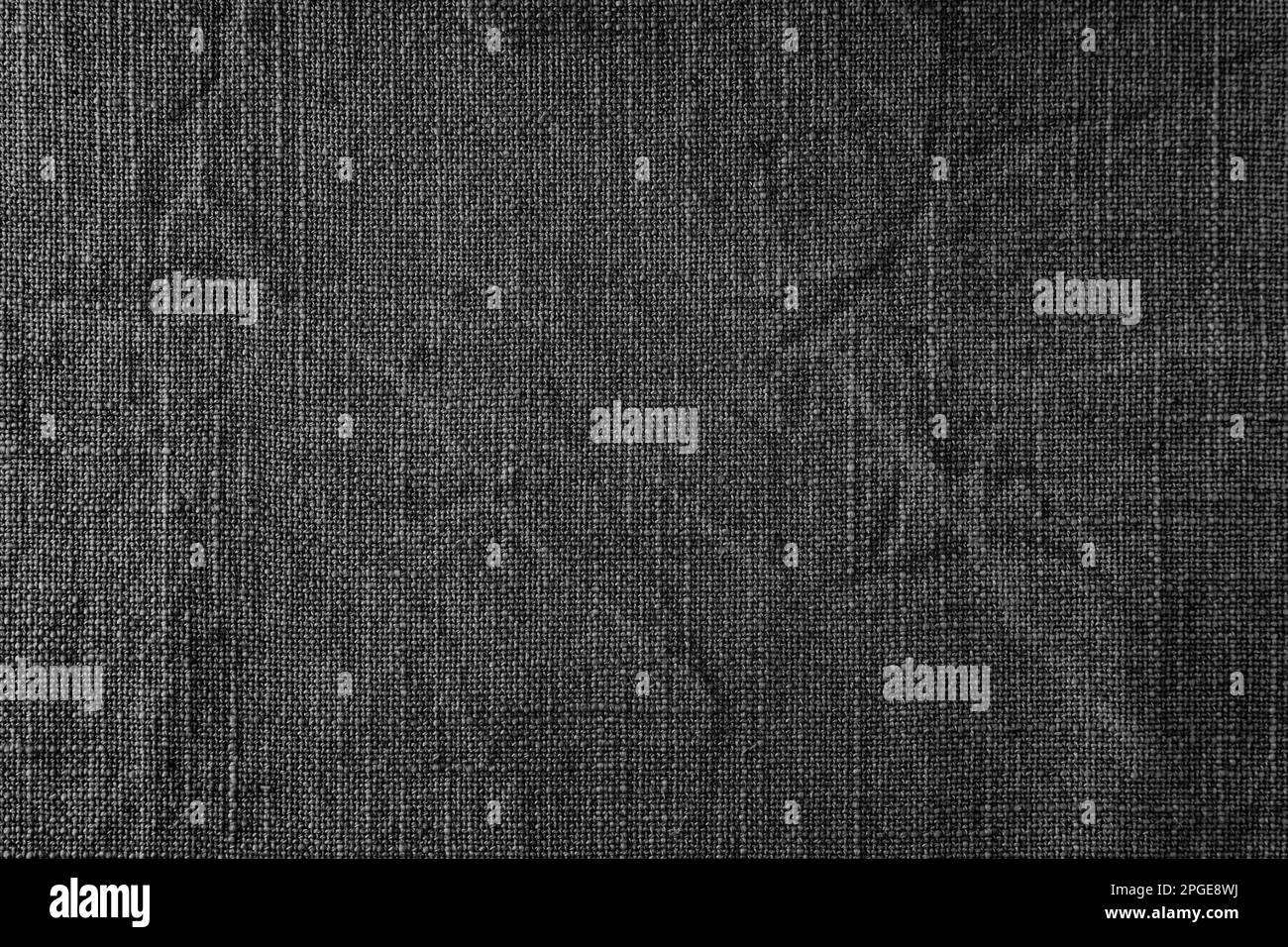 Tessuto di lino naturale nero sfondo texture tessuto. Superficie in tessuto di lino, tovaglia, tappezzeria, tende tessili. Vista dall'alto, primo piano Foto Stock