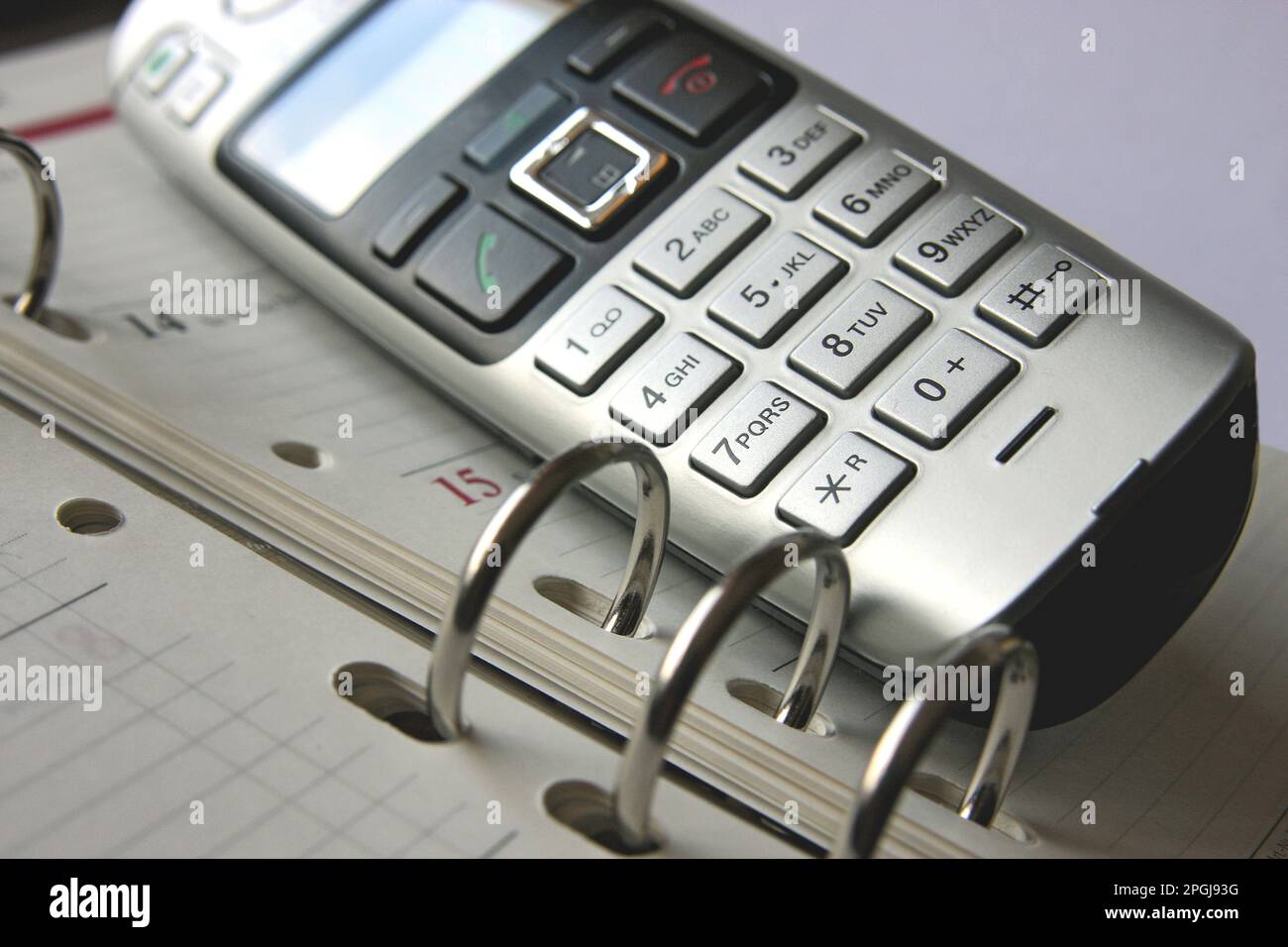 ricevitore telefonico su agenda Foto Stock