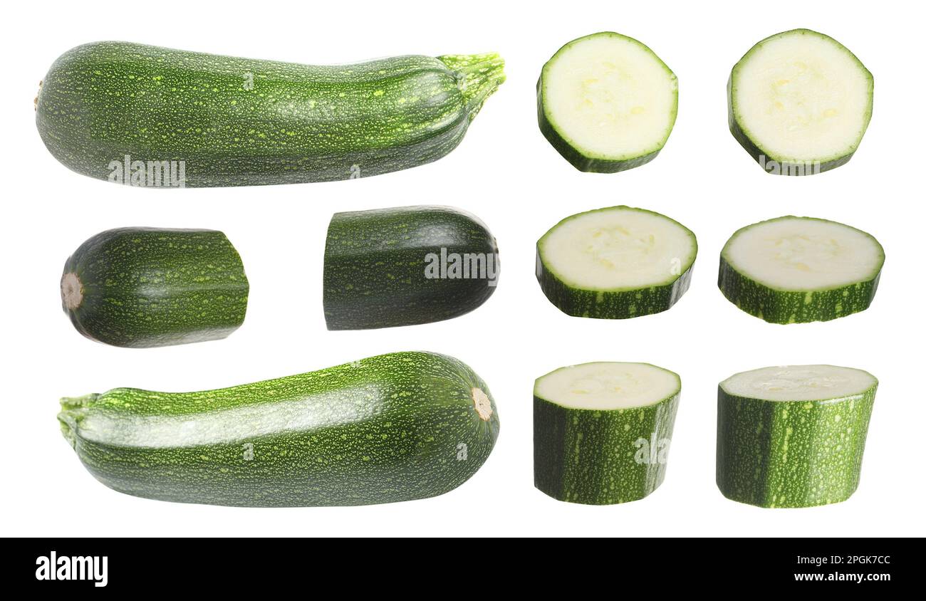 Set di zucchine fresche mature su sfondo bianco Foto Stock
