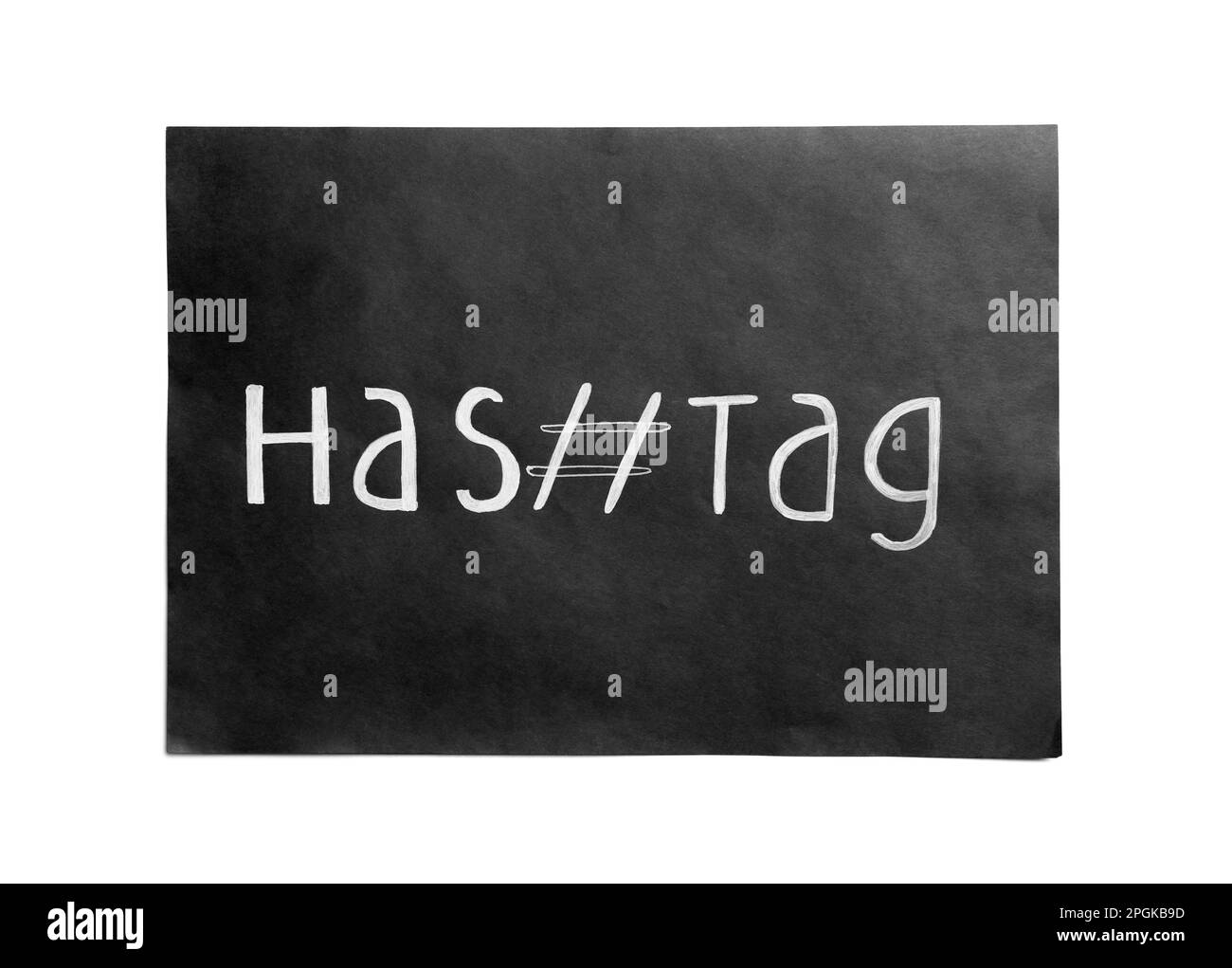 Carta nera con hashtag parola e simbolo su sfondo bianco, vista dall'alto Foto Stock