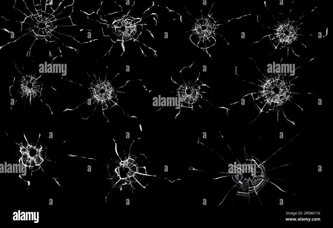 Grande collezione di crepe di vetro rotto su sfondo nero. Concetto di scatti sulla finestra per il design Foto Stock