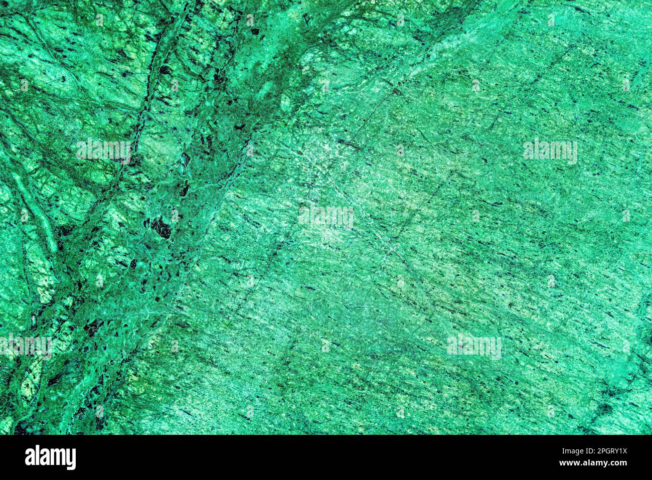 Texture di piastrelle di marmo verde con graffi. Sfondo astratto per il design. Foto Stock