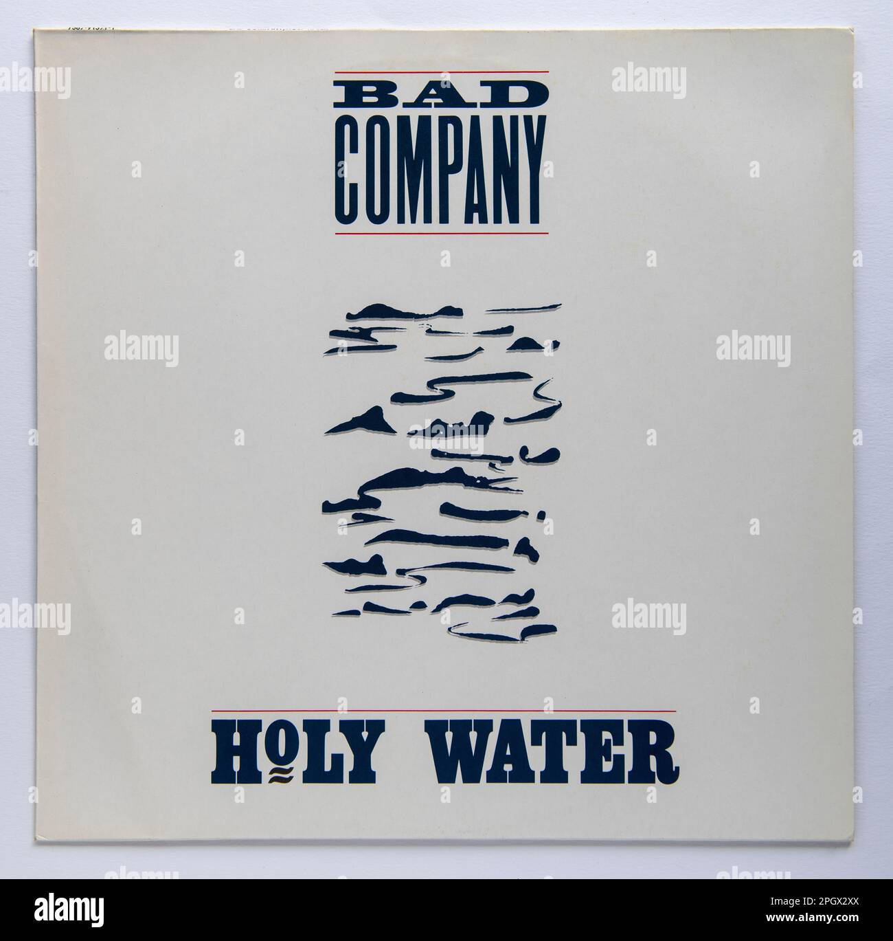 LP Cover of Holy Water, il nono album in studio della rock band Bad Company, pubblicato nel 1990 Foto Stock