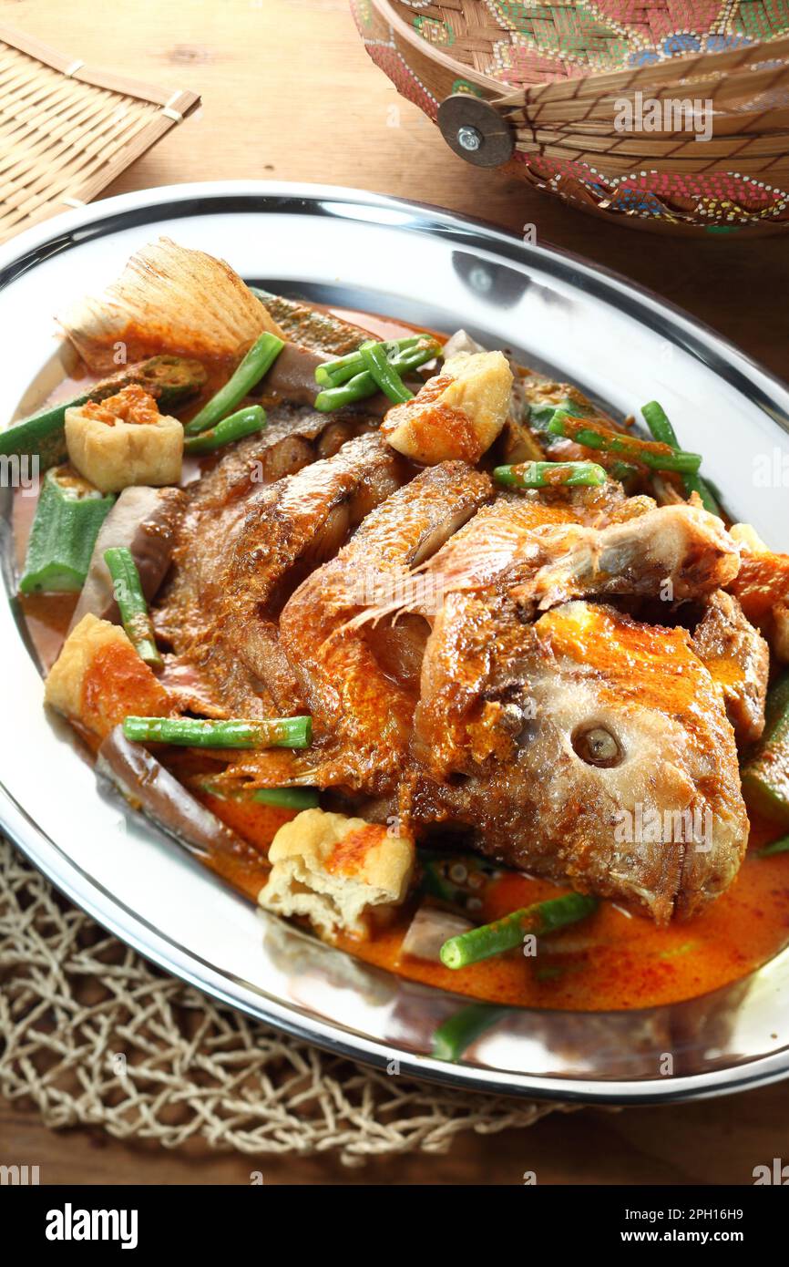 Cucina asiatica tilapia pesce curry Foto Stock