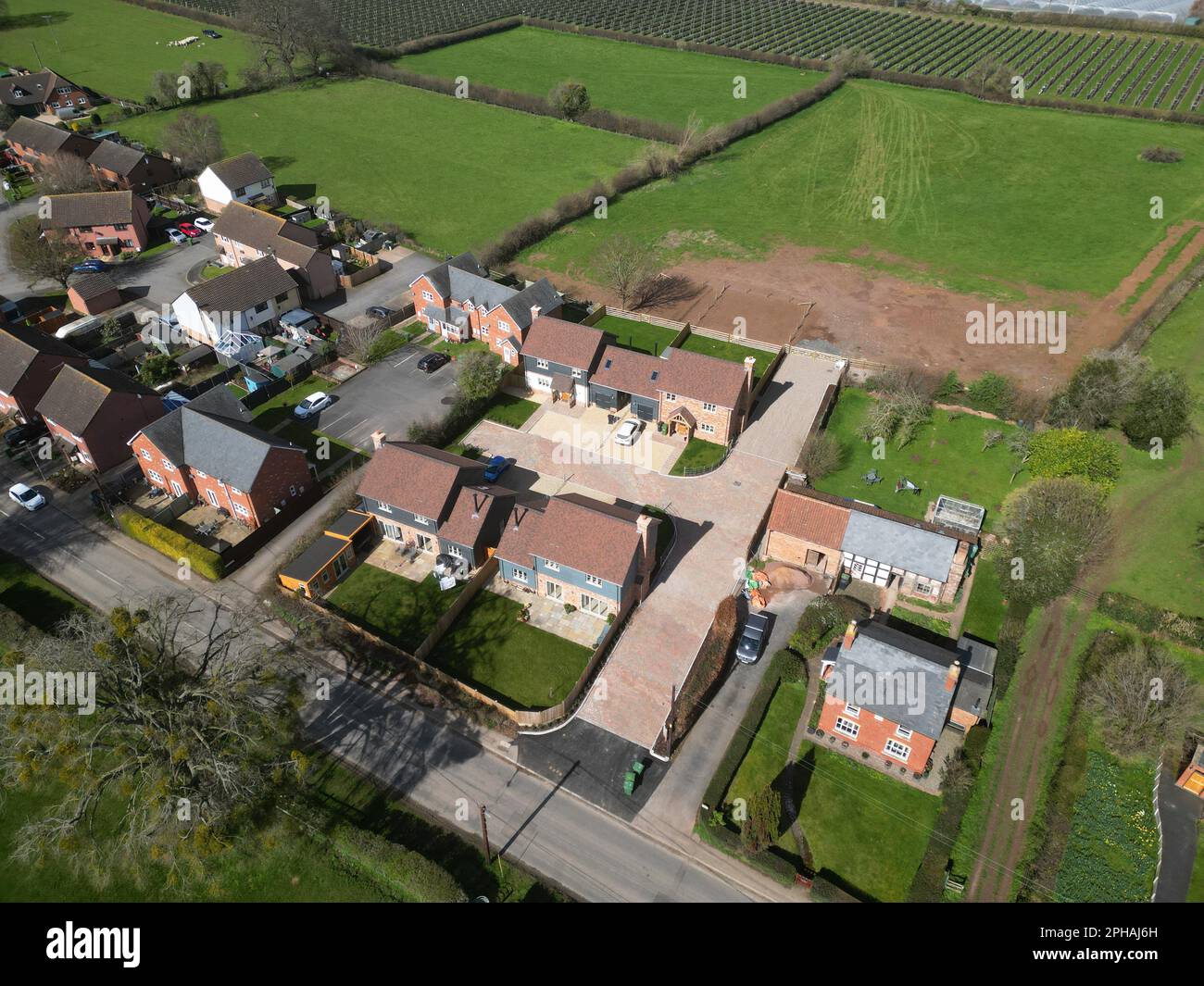 Marden Herefordshire Regno Unito moderna casa indipendente in un villaggio rurale vista aerea presa marzo 2023 Foto Stock