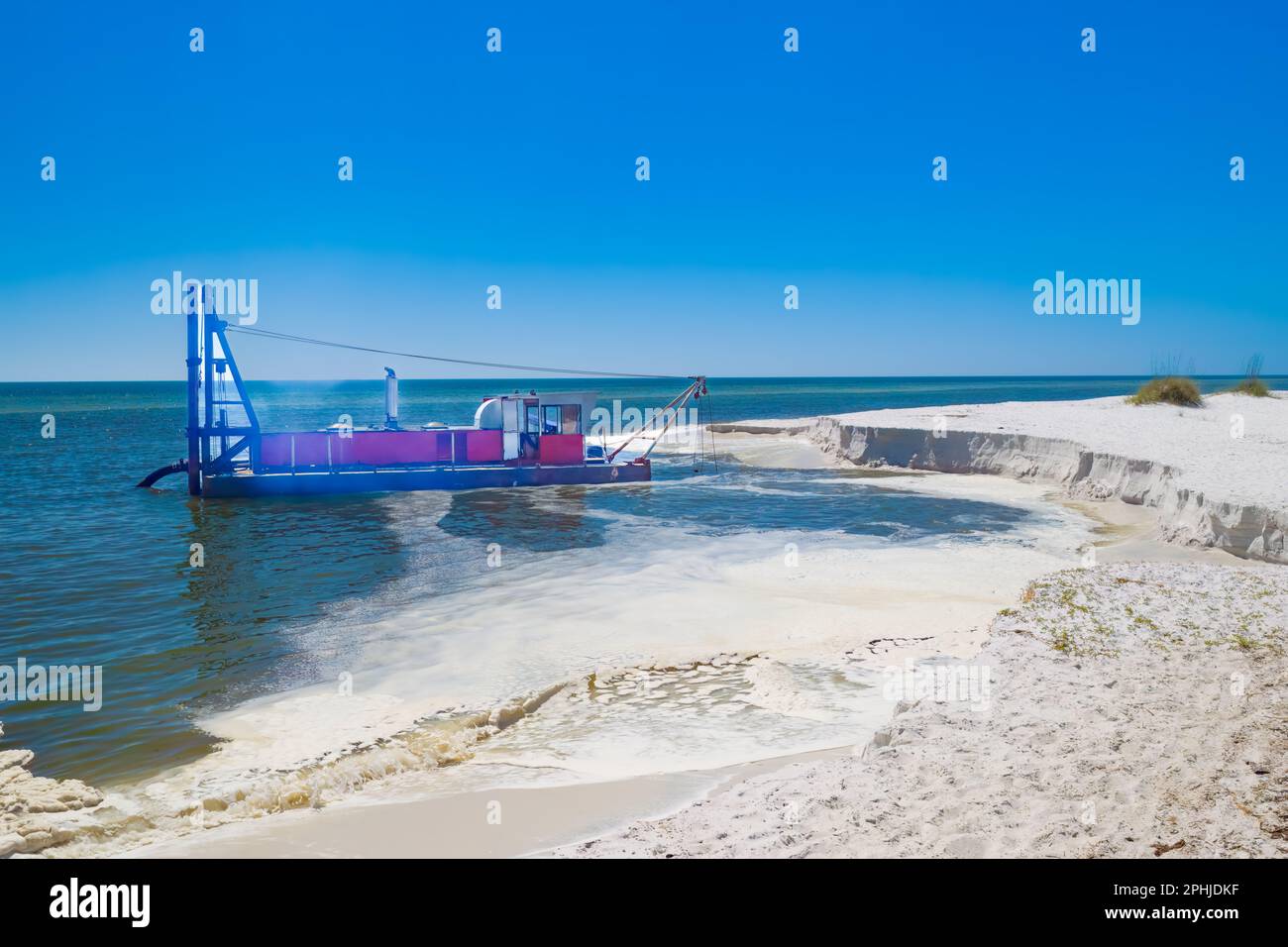 Dragare la spiaggia di sabbia a Mexico Beach Florida USA Foto Stock