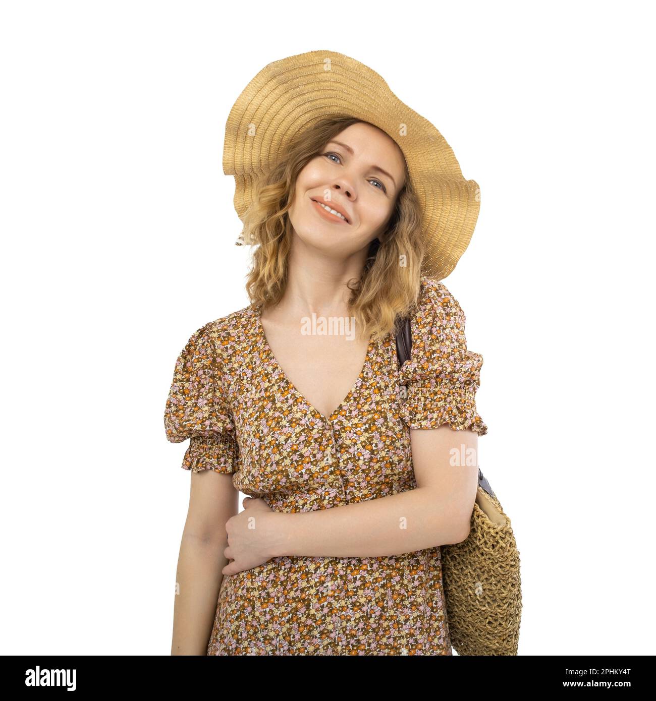 Donna adulta abbastanza matura di 40 anni in cappello e vestito isolato su sfondo bianco. Foto Stock