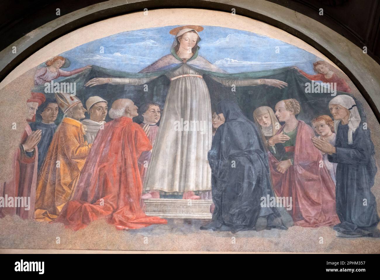 Madonna della Misericordia di Ghirlandaio, per la famiglia Vespucci. Amerigo alla sua destra. San Salvatore a Ognissanti, Firenze Foto Stock