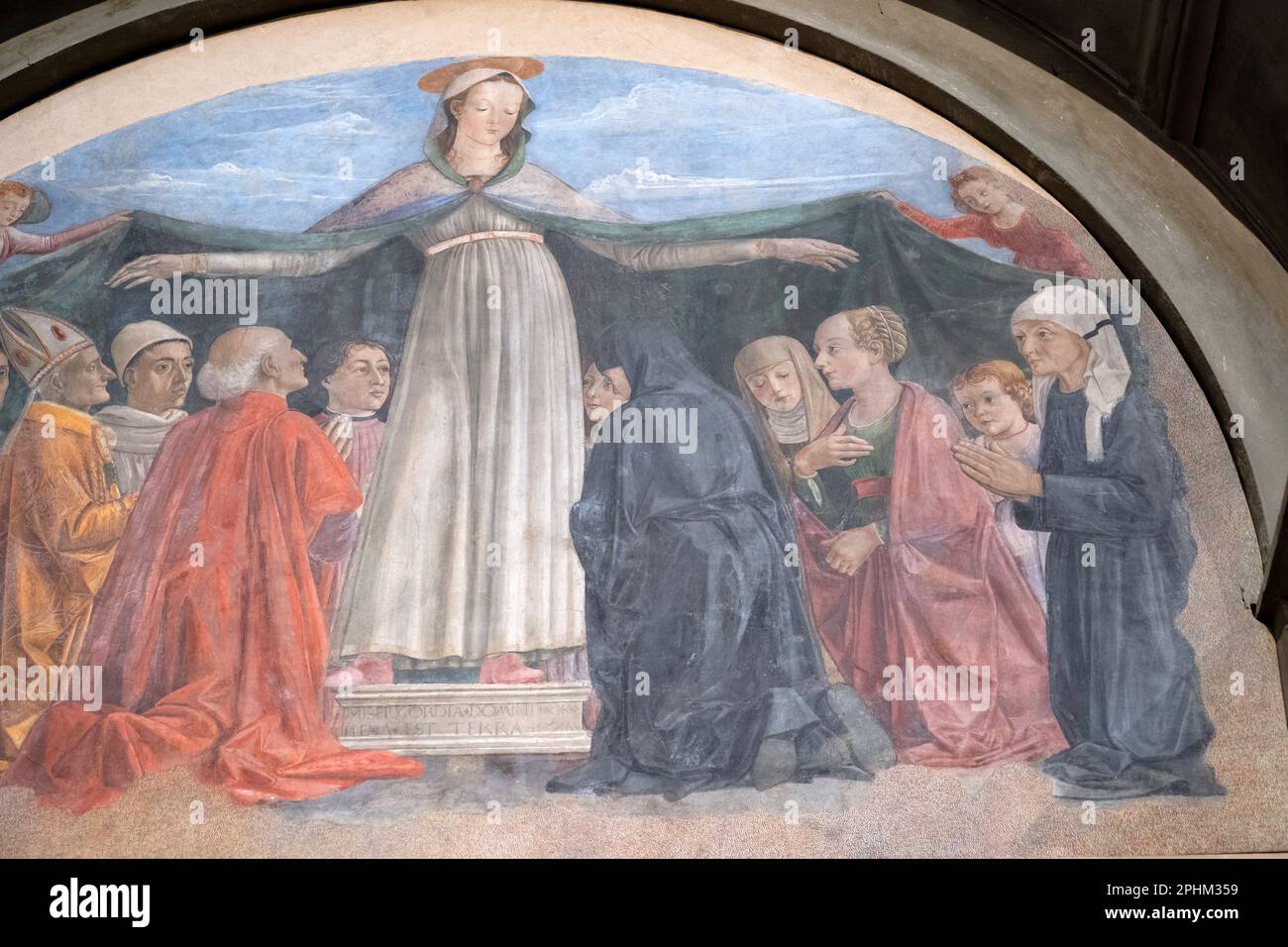 Madonna della Misericordia di Ghirlandaio, per la famiglia Vespucci. Amerigo alla sua destra. San Salvatore a Ognissanti, Firenze Foto Stock