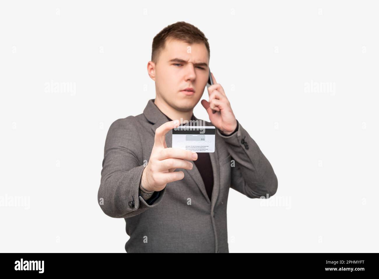 scam telefono chiamata maschio banca cliente dati della carta di credito Foto Stock