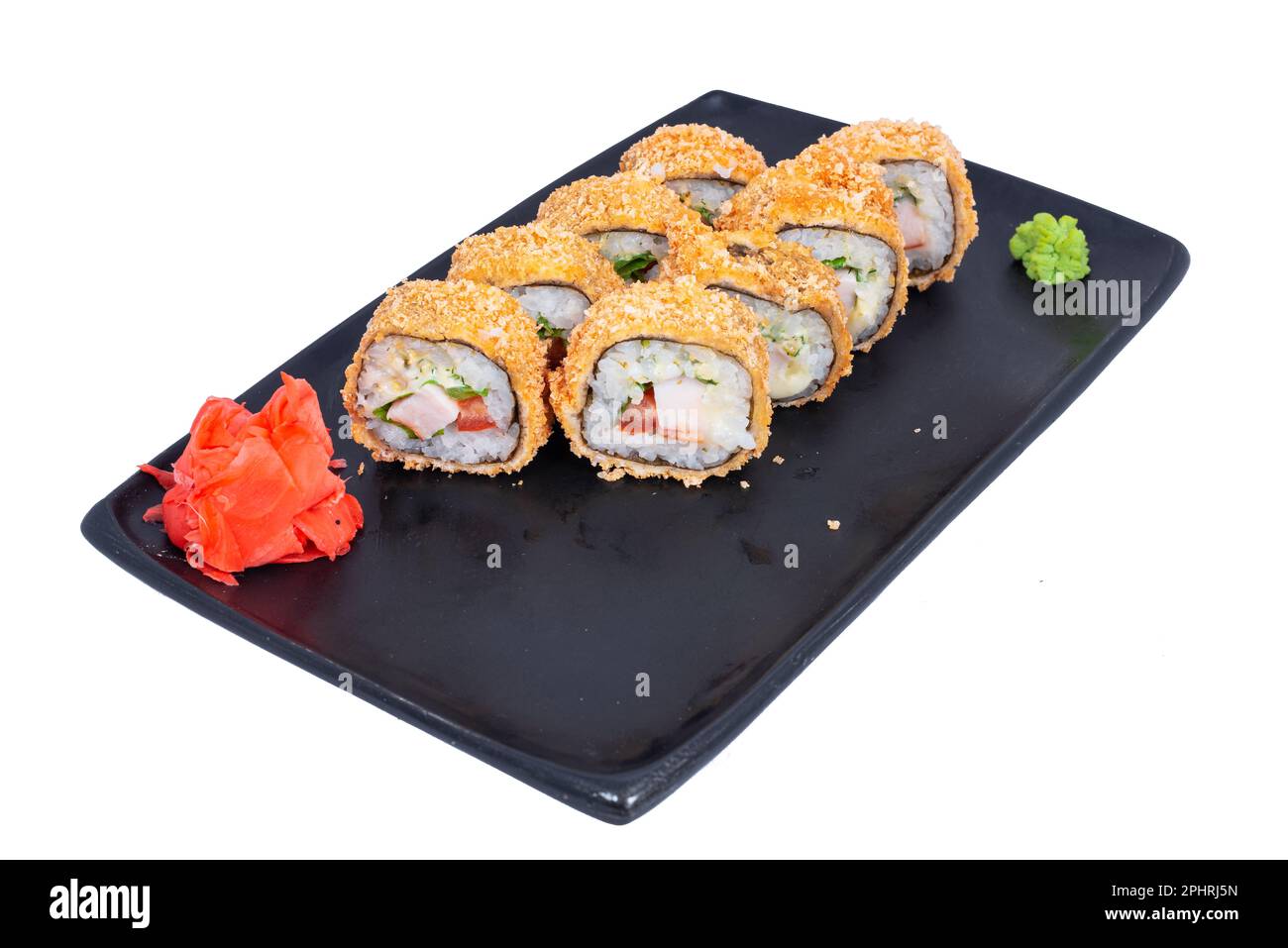 Cucina giapponese - Sushi Roll con gamberi e conger, avocado, Tobiko e formaggio. Sushi roll tempura, cucina giapponese Foto Stock
