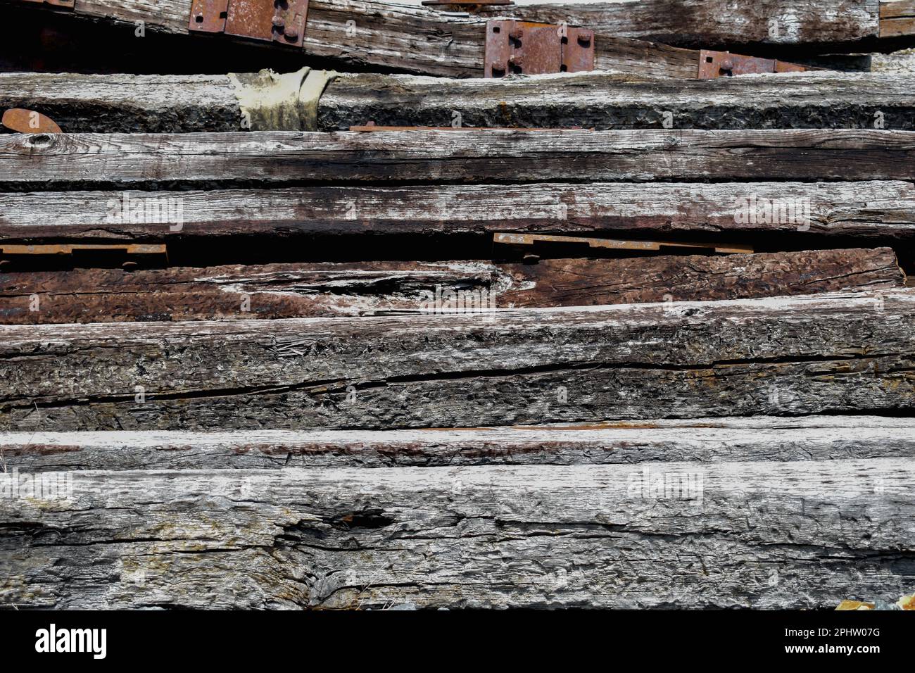 Primo piano vecchi binari ferroviari incrociati Foto Stock