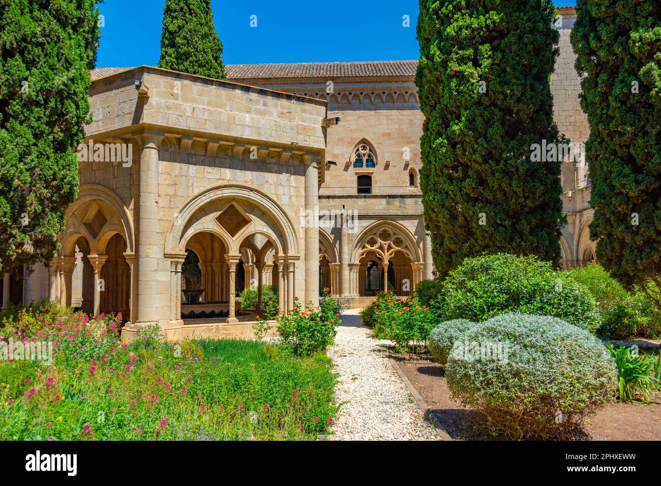 Chiostro al Monastero di Santa Maria de Poblet in Spagna. Foto Stock