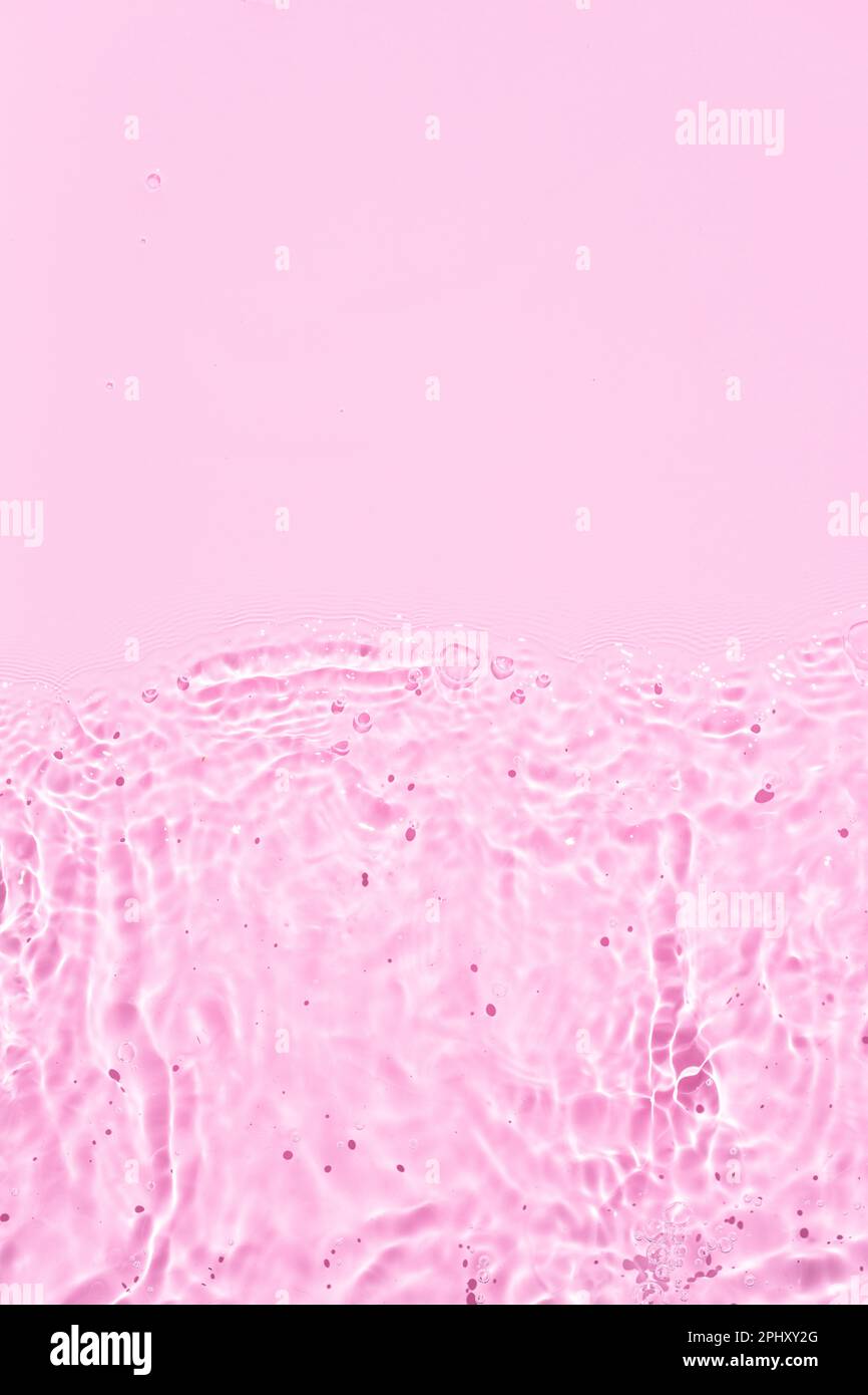 Banner di rosa Abstract acqua di fondo texture con ondate e onde. Spazio di copia Foto Stock