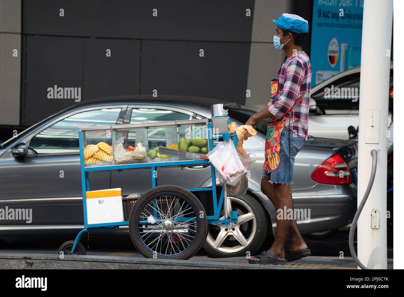 Mercanti di cortine di strada sulle strade di Sukhumvit, Bangkok, Thailandia Foto Stock