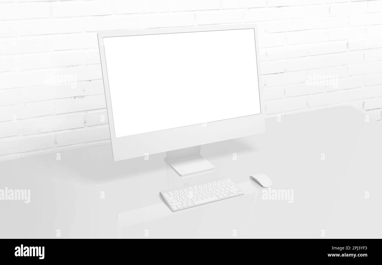 Schermo bianco per computer sulla scrivania con parete in mattoni sullo sfondo. Schermo isolato per presentazioni di mockup, app o pagine Web Foto Stock