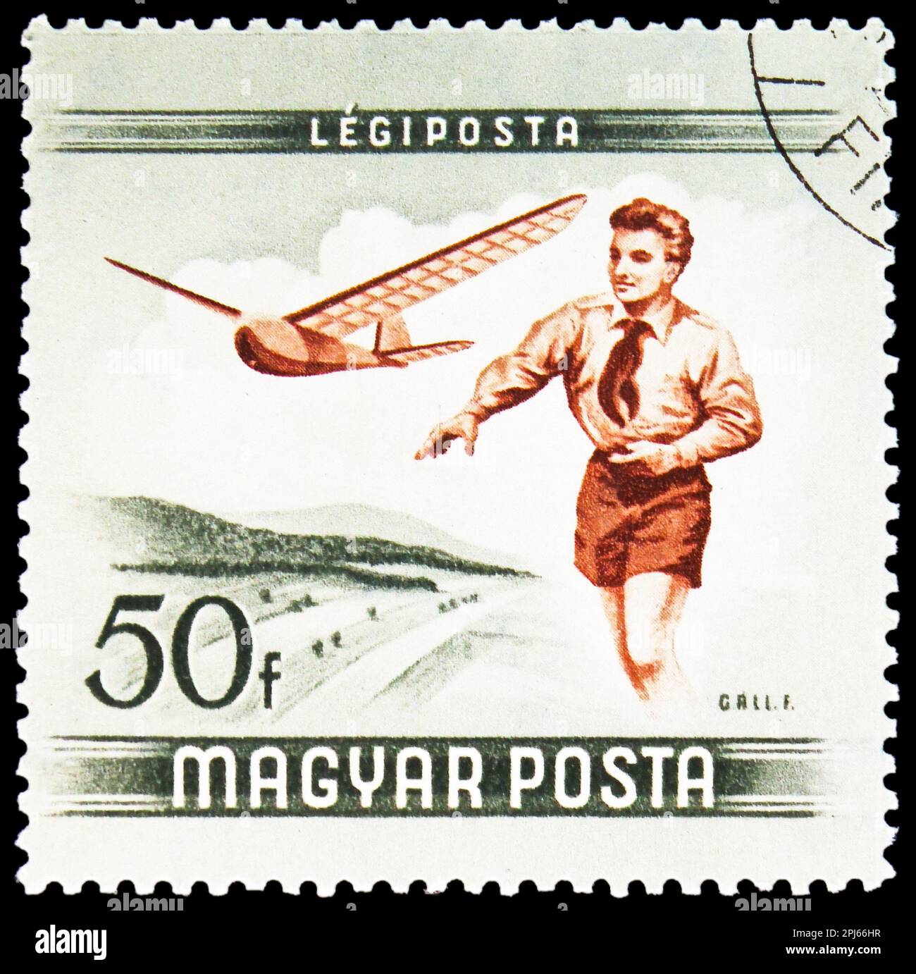 MOSCA, RUSSIA - 25 MARZO 2023: Francobollo stampato in Ungheria mostra Boy Flying Model Glider, aerei serie, circa1954 Foto Stock