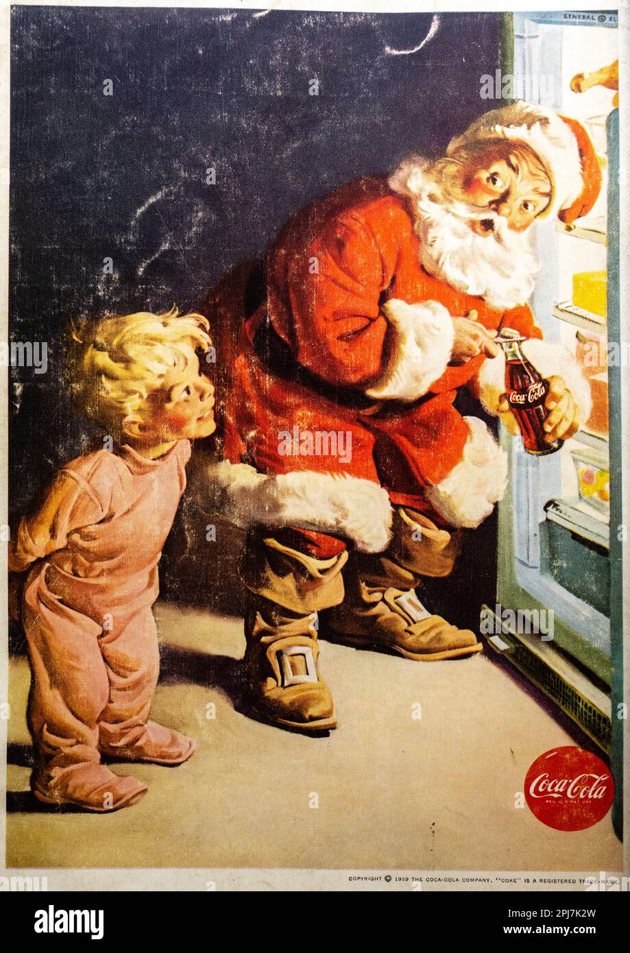 Annuncio natalizio Coca-Cola 1949. Babbo Natale apre un frigorifero per un bambino con opere d'arte di Haddon Sundblom Foto Stock