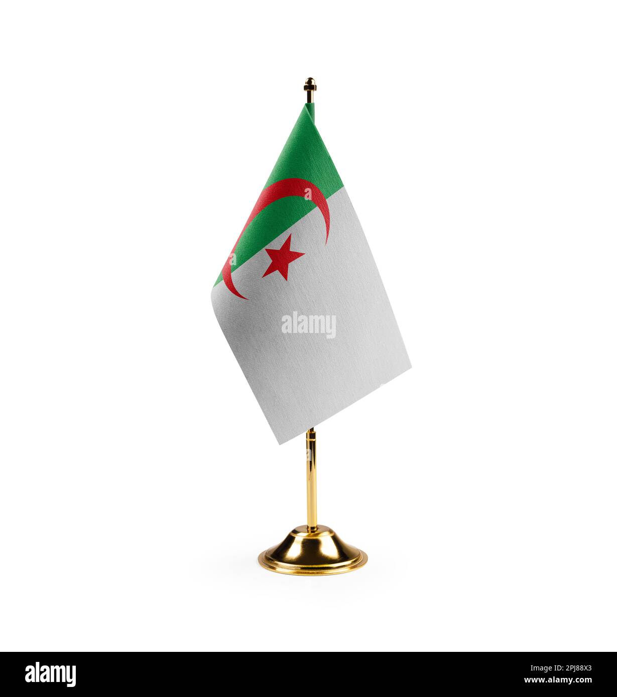 Piccola bandiera nazionale dell'Algeria su sfondo bianco. Foto Stock