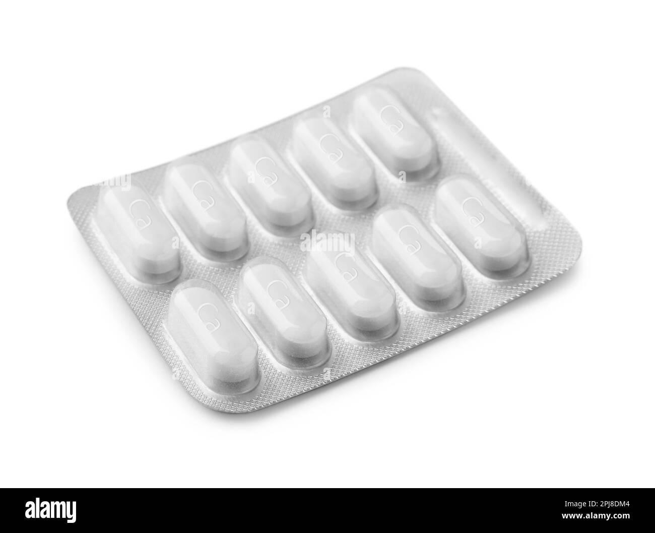 Pillole di supplemento di calcio in blister su sfondo bianco Foto Stock