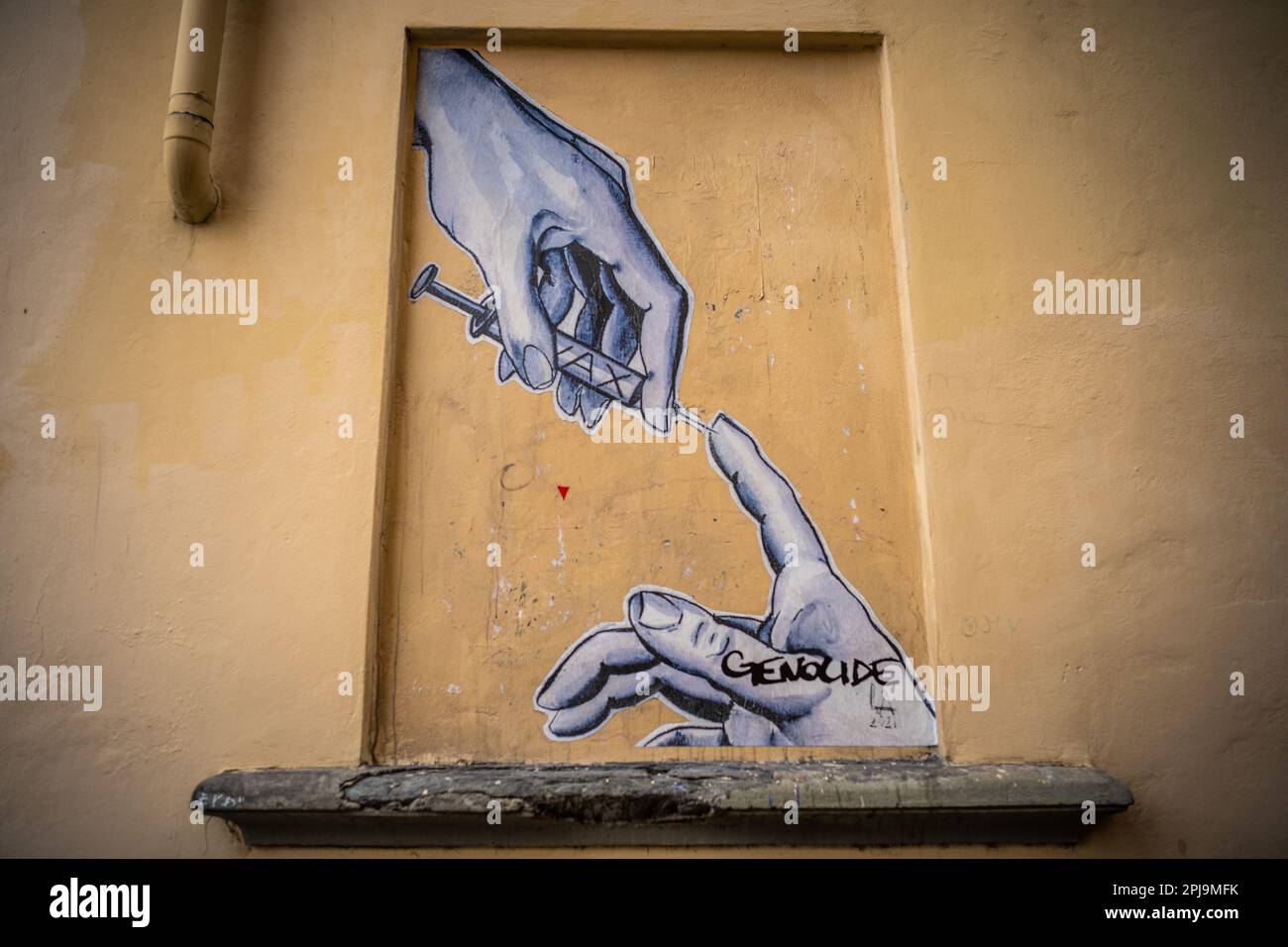 Opera anti-vax su un muro a Firenze Foto Stock