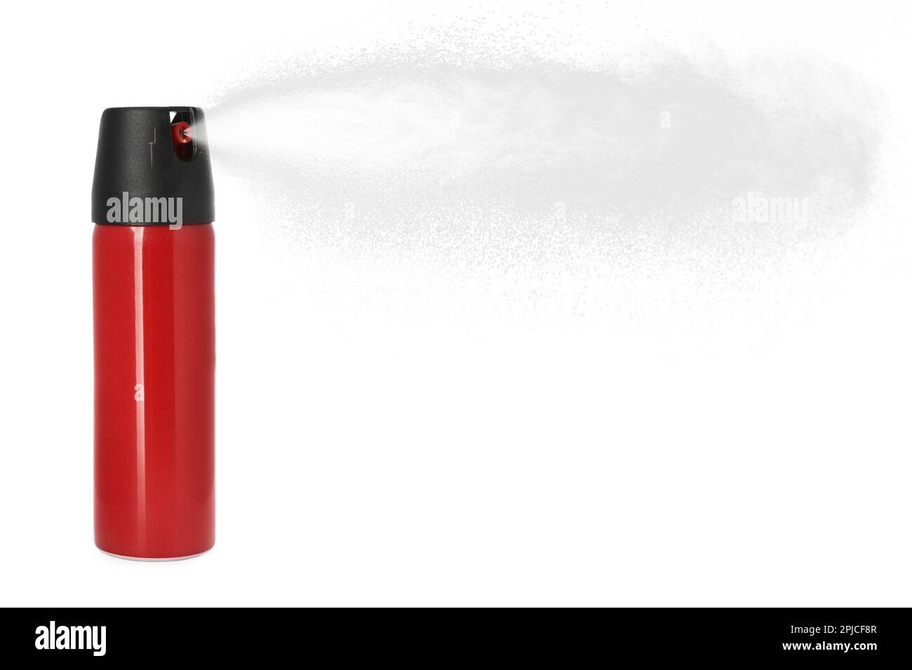 Uso di pepe spray su sfondo bianco Foto Stock