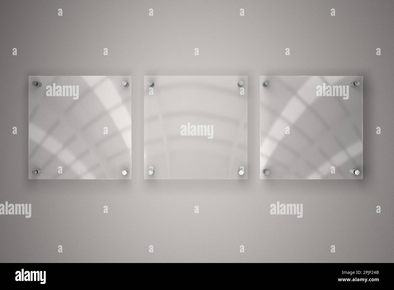 Elegante e professionale: Targhe in plexiglass su sfondo grigio Foto Stock