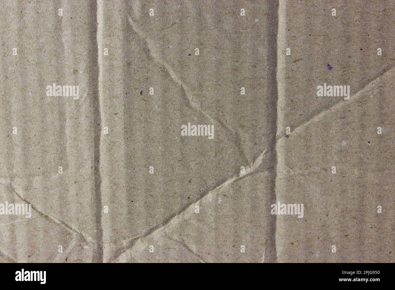 Fondo di cartone ondulato stropicciato. Carta ondulata per imballaggio Foto Stock
