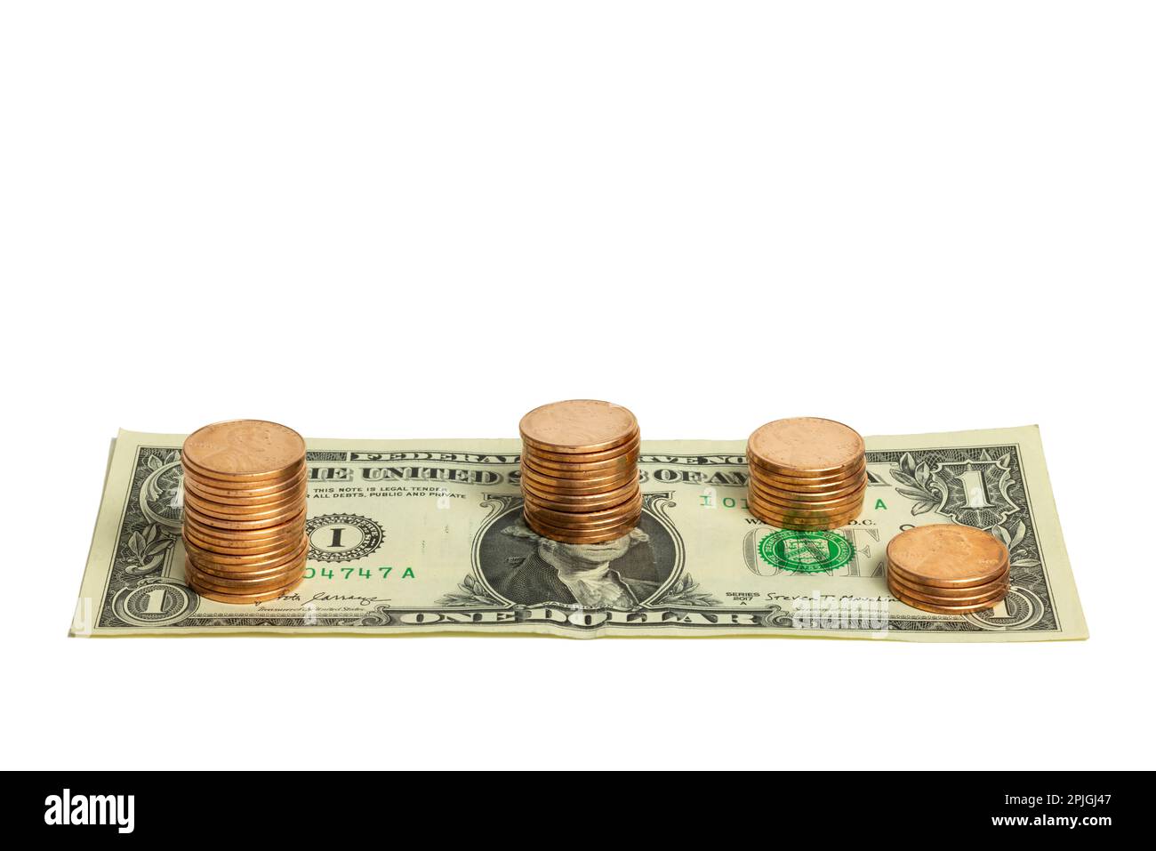 Pile di Pennies su Un dollaro Foto Stock