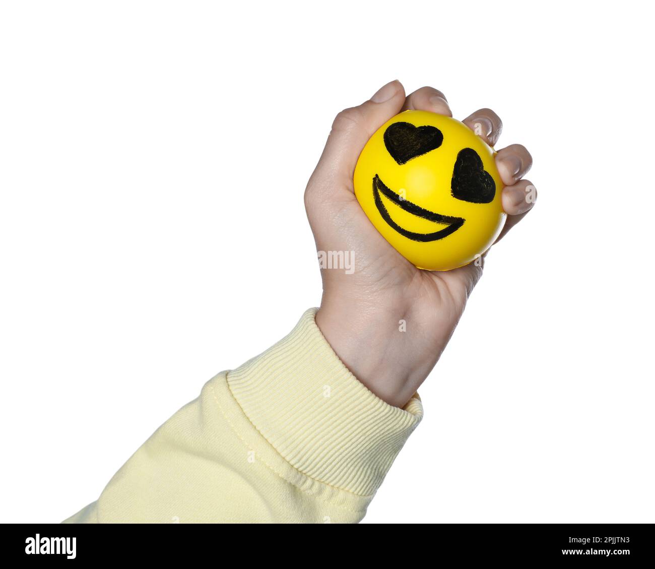 Donna spremitura palla antistress con faccia divertente su sfondo bianco,  primo piano Foto stock - Alamy