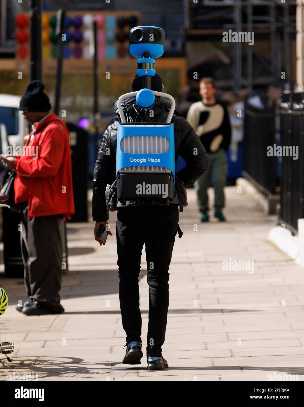 Lo zaino Street View Trekker di Google in uso a Golden Square, Londra. Foto Stock