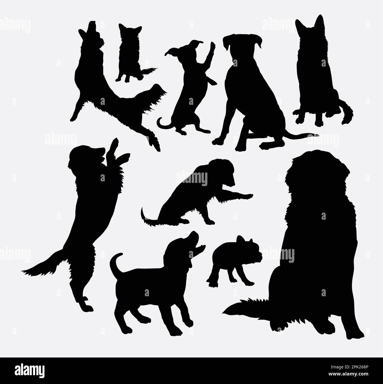 Silhouette di cani e cuccioli Illustrazione Vettoriale