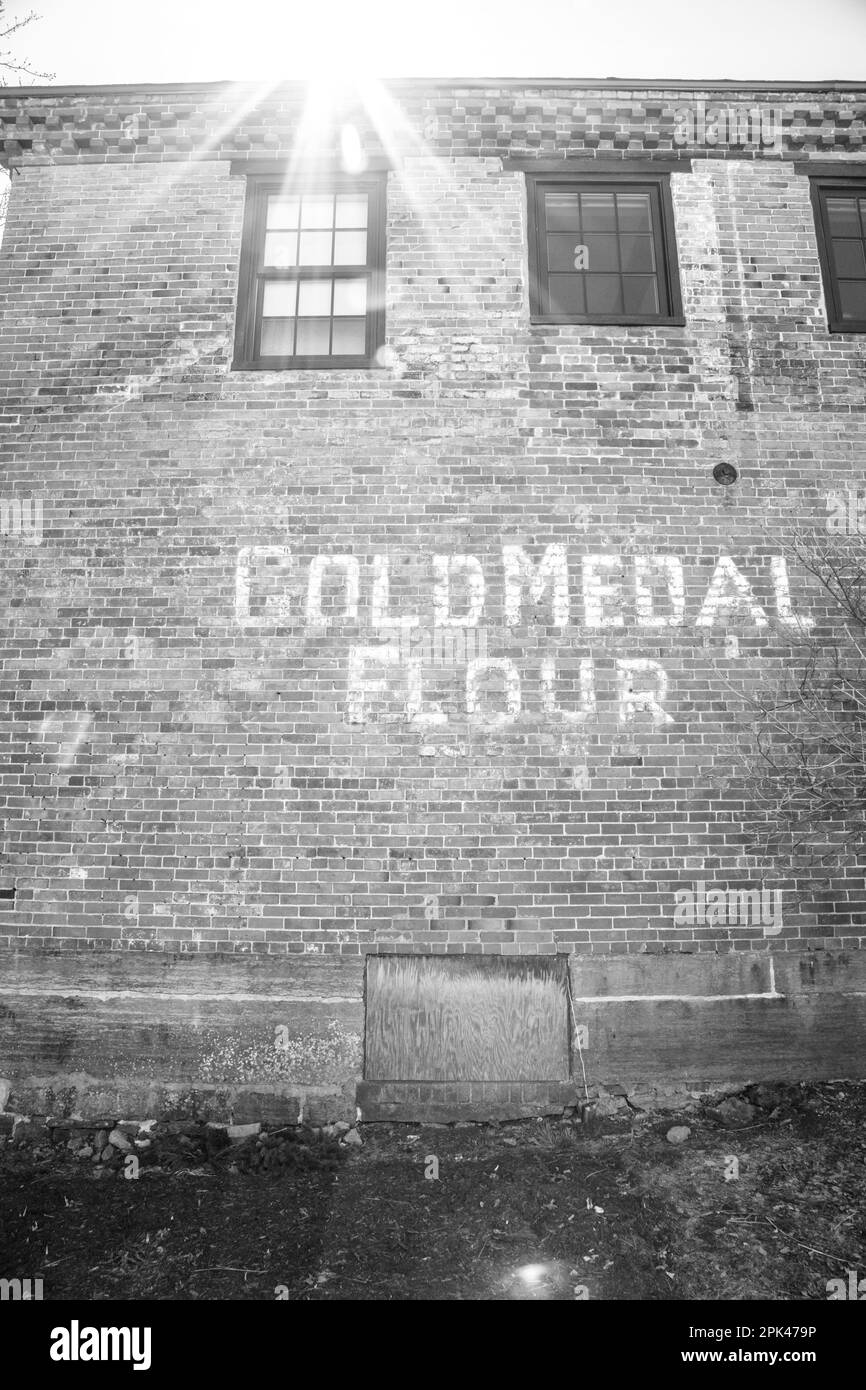 Medaglia d'oro Flour annuncio dipinto su muro di mattoni Foto Stock