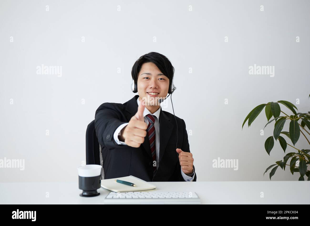Uomo d'affari che ha una riunione remota Foto Stock