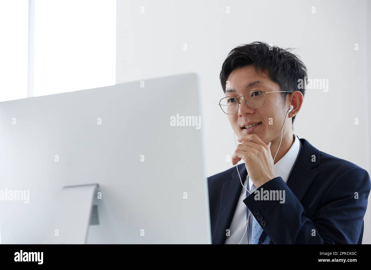 Uomini d'affari che hanno una riunione remota Foto Stock