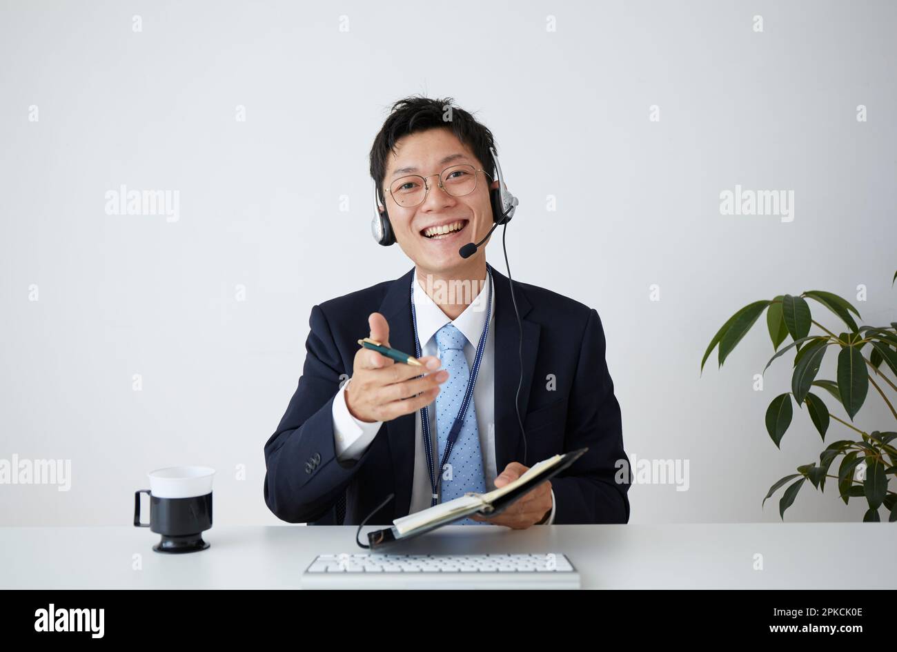 Uomo d'affari che ha una riunione remota Foto Stock