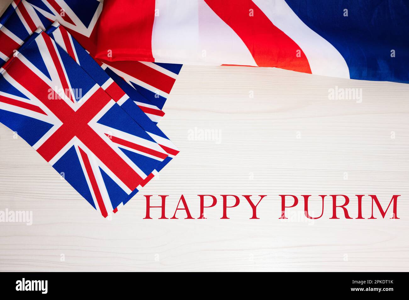 Buon Purim. Concetto di vacanze britanniche. Vacanze in Regno Unito. Bandiera della Gran Bretagna sfondo. Foto Stock